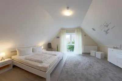 Ein Bett oder Betten in einem Zimmer der Unterkunft Ferienhaus 