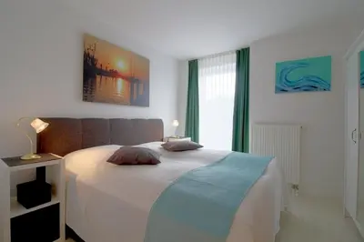 Ein Bett oder Betten in einem Zimmer der Unterkunft KD12-46 NordseeFlair