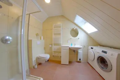 Ein Badezimmer in der Unterkunft KW21a Ferienhaus Silbermöwe