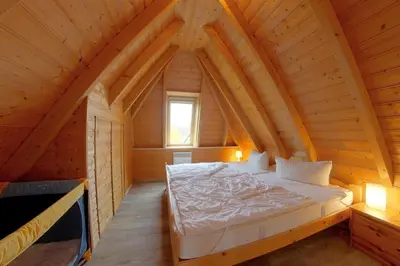 Ein Bett oder Betten in einem Zimmer der Unterkunft SV3 Kniepsand 3