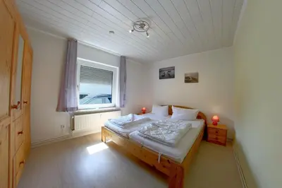Ein Bett oder Betten in einem Zimmer der Unterkunft SI74 Haus LaMira