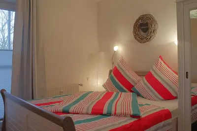 Ein Bett oder Betten in einem Zimmer der Unterkunft Haus Amrum WE 10