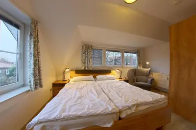 Ein Bett oder Betten in einem Zimmer der Unterkunft KI 22-WE 01 Wohlfühldomizil