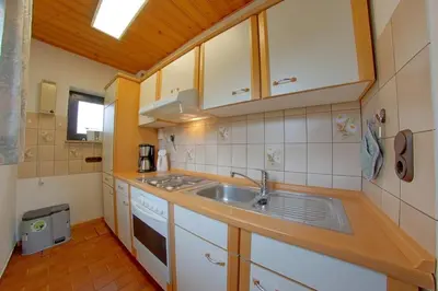 Küche/Küchenzeile in der Unterkunft SW6 Haus Wittsand