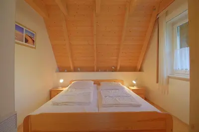 Ein Bett oder Betten in einem Zimmer der Unterkunft SV3 Westertill 2