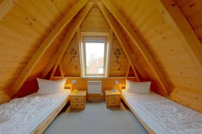 Ein Bett oder Betten in einem Zimmer der Unterkunft SV2 Westertill 12