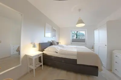 Ein Bett oder Betten in einem Zimmer der Unterkunft Lilli Marleen WE 04