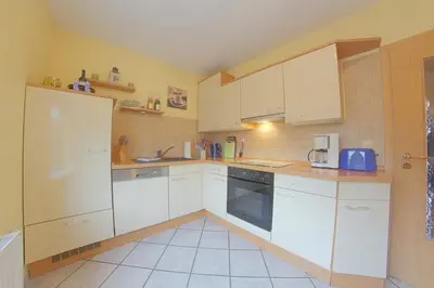 Küche/Küchenzeile in der Unterkunft KW19 Ferienhaus Kormoranweg