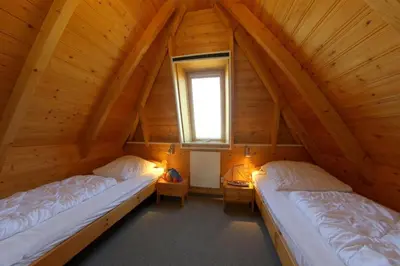 Ein Bett oder Betten in einem Zimmer der Unterkunft SV2 Nordertill 13