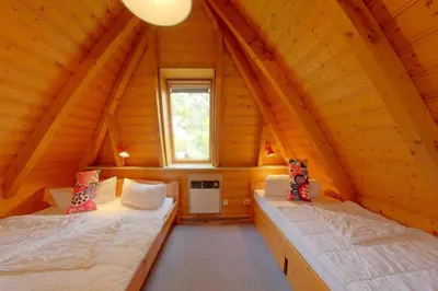 Ein Bett oder Betten in einem Zimmer der Unterkunft SV2 Roter Sand 7