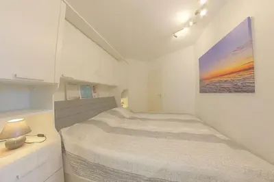 Ein Bett oder Betten in einem Zimmer der Unterkunft KW42-109 Triton mit Schwimmbad