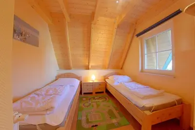 Ein Bett oder Betten in einem Zimmer der Unterkunft SV3 Mellumplate 56