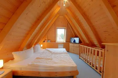 Ein Bett oder Betten in einem Zimmer der Unterkunft SV3 Westertill 39