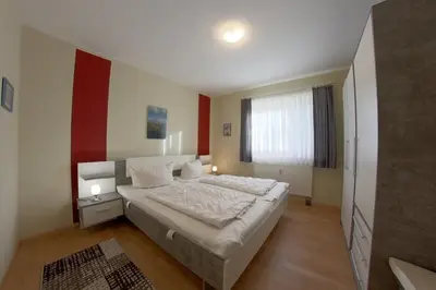 Ein Bett oder Betten in einem Zimmer der Unterkunft DW10a FeWo Diekkieker