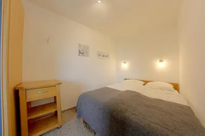 Ein Bett oder Betten in einem Zimmer der Unterkunft Haus Borkum WE 19