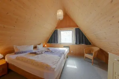 Ein Bett oder Betten in einem Zimmer der Unterkunft SR Eversand 11