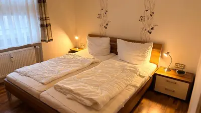 Ein Bett oder Betten in einem Zimmer der Unterkunft Haus Nordseeblick Wohnung 29