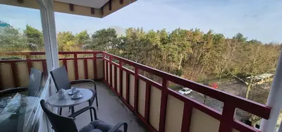 Ein Balkon oder eine Terrasse in der Unterkunft Terrassenhaus, FeWo 63