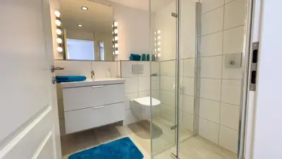 Ein Badezimmer in der Unterkunft Kapitänshaus FeWo 7