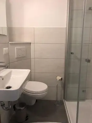 Ein Badezimmer in der Unterkunft Frische Brise FeWo 10 08