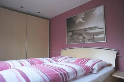 Ein Bett oder Betten in einem Zimmer der Unterkunft Dat Hus
