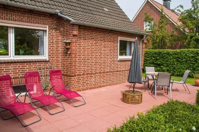 Ein Garten an der Unterkunft Ferienhaus, Kleine Perle