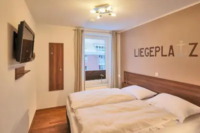 Ein Bett oder Betten in einem Zimmer der Unterkunft Residenz Hohe Lith 321