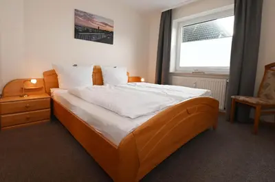 Ein Bett oder Betten in einem Zimmer der Unterkunft Mare Comfort Wohnung 6