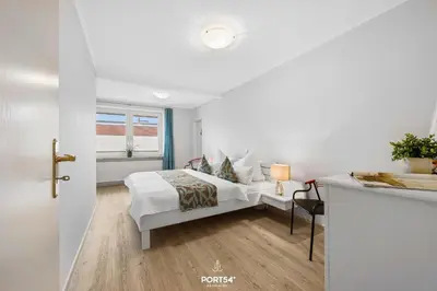 Ein Bett oder Betten in einem Zimmer der Unterkunft Ferienwohnung Muschel Büsum