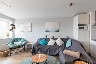 Ein Sitzbereich in der Unterkunft Haus Nordseebrandung Wohnung 12