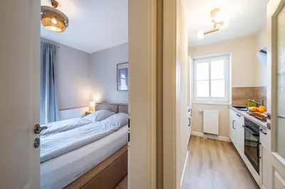 Ein Bett oder Betten in einem Zimmer der Unterkunft Westerwarft 5