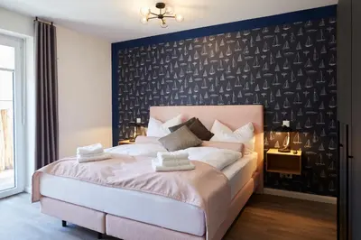 Ein Bett oder Betten in einem Zimmer der Unterkunft Kattegat Apartment 03