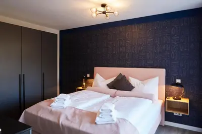 Ein Bett oder Betten in einem Zimmer der Unterkunft Kattegat Apartment 05