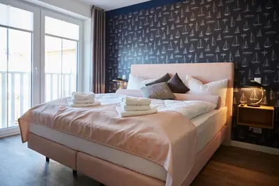 Ein Bett oder Betten in einem Zimmer der Unterkunft Kattegat Apartment 14