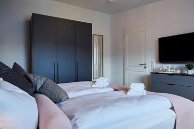 Ein Bett oder Betten in einem Zimmer der Unterkunft Kattegat Apartment 26