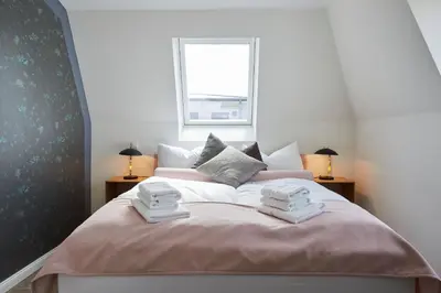 Ein Bett oder Betten in einem Zimmer der Unterkunft Kattegat Apartment 31