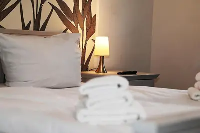 Ein Bett oder Betten in einem Zimmer der Unterkunft Bernstein Mare Luxor Penthouse 01