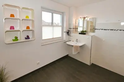 Ein Badezimmer in der Unterkunft Bernstein Mare Luxor Penthouse 01
