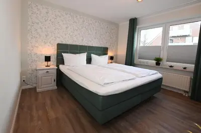 Ein Bett oder Betten in einem Zimmer der Unterkunft Bernstein Mare-Supreme Wohnung 1