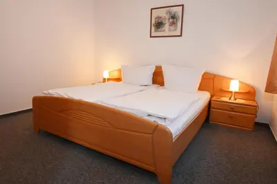 Ein Bett oder Betten in einem Zimmer der Unterkunft Bernstein Mare-Supreme Wohnung 2
