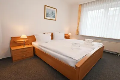 Ein Bett oder Betten in einem Zimmer der Unterkunft Bernstein Mare-Supreme Wohnung 4