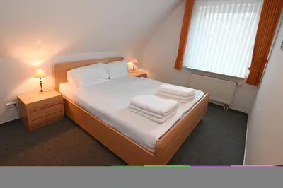 Ein Bett oder Betten in einem Zimmer der Unterkunft Bernstein Mare-Supreme Wohnung 6