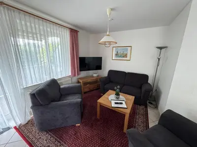 Ein Sitzbereich in der Unterkunft Haus Nordlicht I