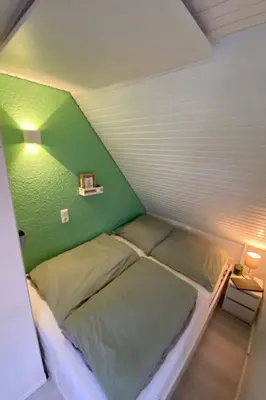 Ein Bett oder Betten in einem Zimmer der Unterkunft Apartment Heimathafen Friko by Interhome