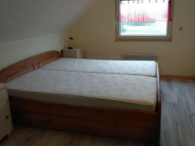 Ein Bett oder Betten in einem Zimmer der Unterkunft Holiday Home mit Garten- Grill und Terrasse by Interhome