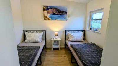 Ein Bett oder Betten in einem Zimmer der Unterkunft Ferienwohnung Dennis