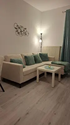 Ein Sitzbereich in der Unterkunft City-Appartement Büsum- zentral, Meer & E-Ladestation am Parkplatz