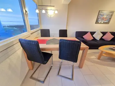Ein Sitzbereich in der Unterkunft Strandhochhaus E3