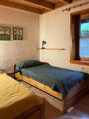Ein Bett oder Betten in einem Zimmer der Unterkunft Haus am Waldrand mit Sauna, nahe Meer