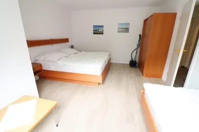 Ein Bett oder Betten in einem Zimmer der Unterkunft Wohnung 2 im Haus Itjen